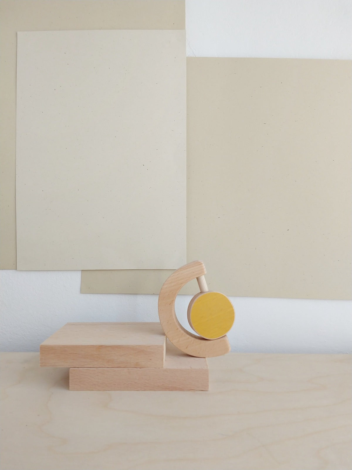 Wooden teether and rattle sun for babies.